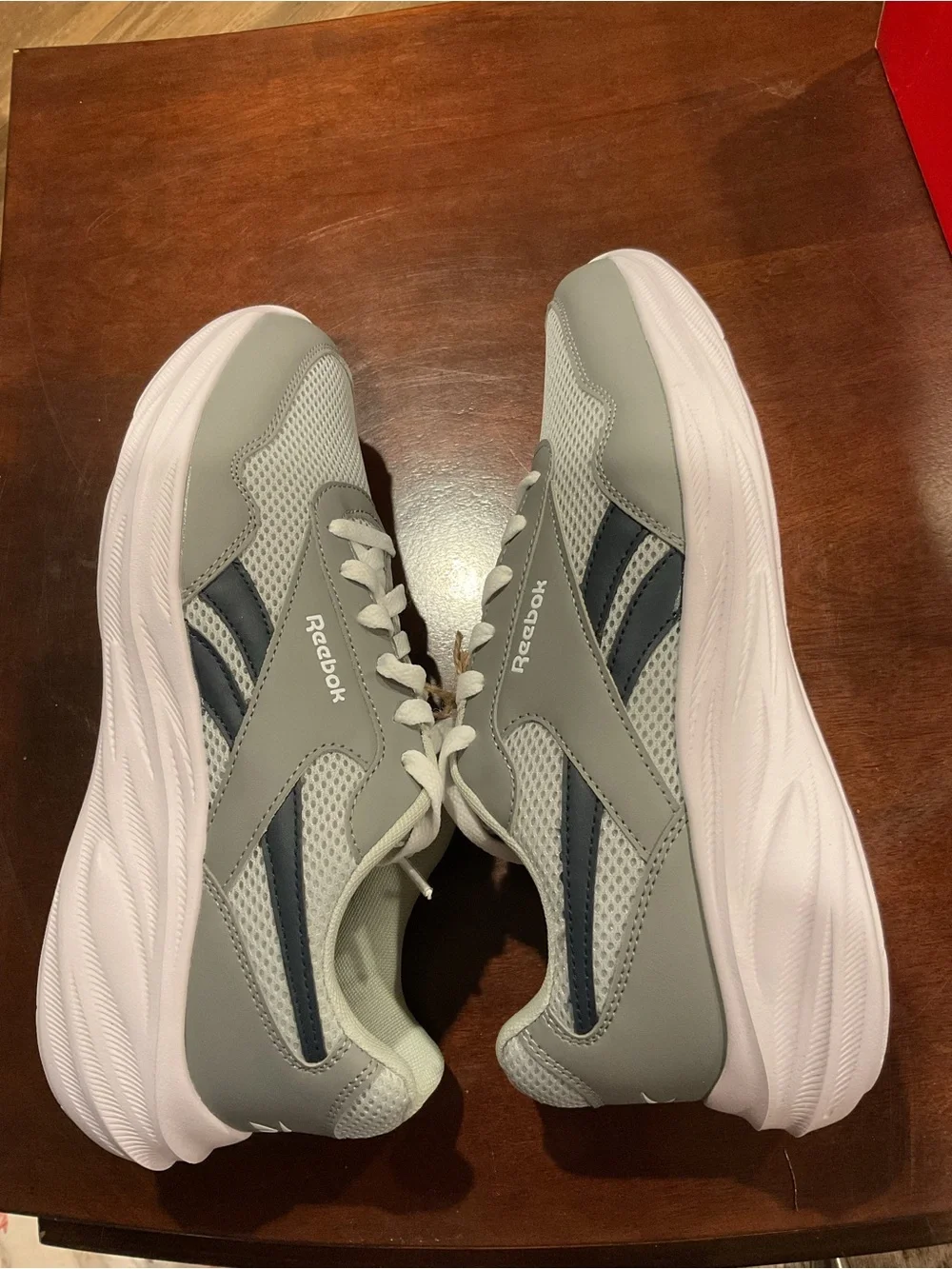 Men's grey running shoes on box size 9